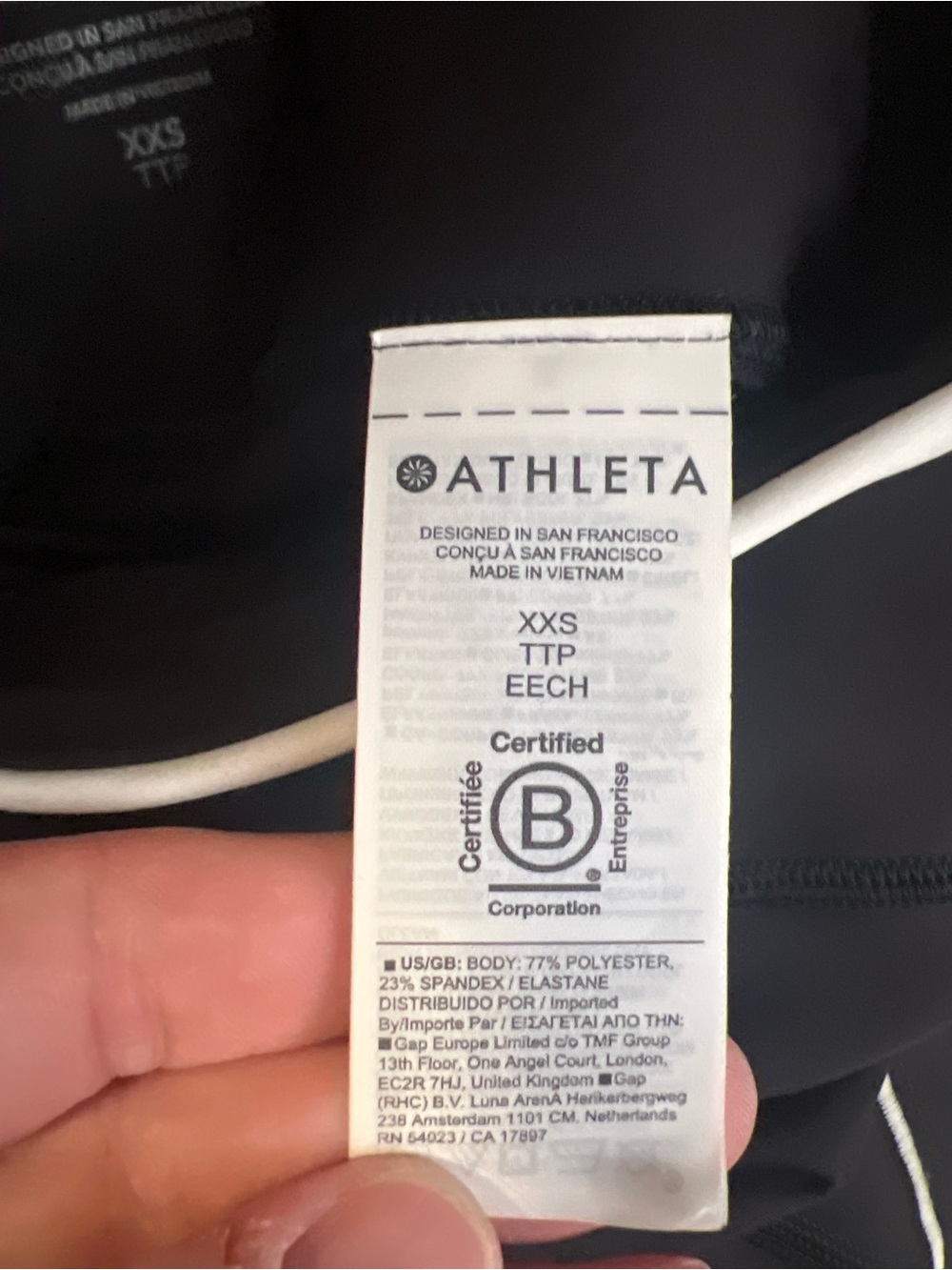NWT Athleta Interval Stash Tipped 7/8 Tight Black White XXS Leggings - Picture 3 of 3